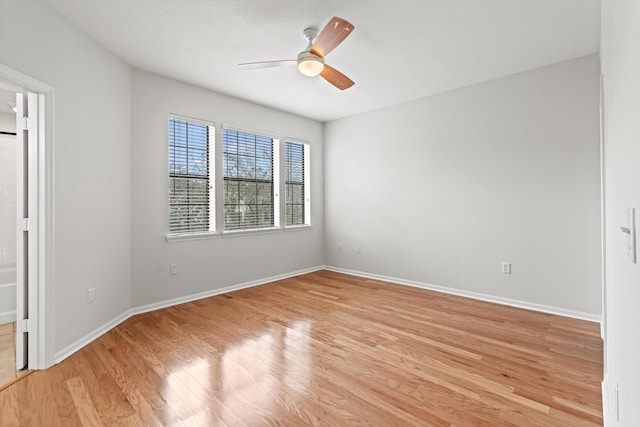 4515 Serena Cir, Saint Augustine, FL 32084 - empty room featuring baseboards, light wood-style floors, and a ceiling fan