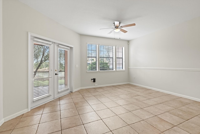 4515 Serena Cir, Saint Augustine, FL 32084 - unfurnished room featuring baseboards, ceiling fan, french doors, and light tile patterned floors