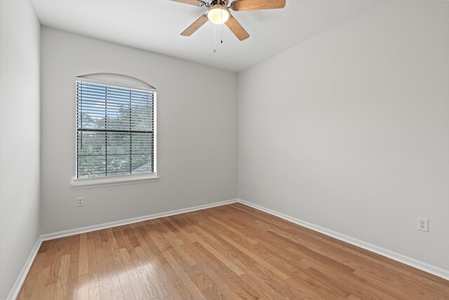 4515 Serena Cir, Saint Augustine, FL 32084 - unfurnished room with baseboards, light wood finished floors, and ceiling fan