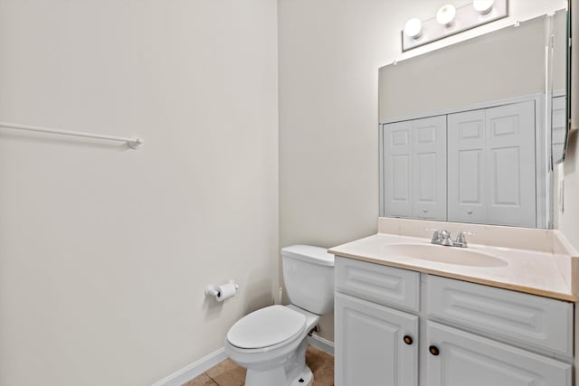 4515 Serena Cir, Saint Augustine, FL 32084 - bathroom with baseboards, toilet, tile patterned flooring, and vanity