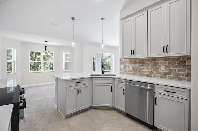 kitchen featuring dishwasher, sink, hanging light fixtures, decorative backsplash, and gray cabinets