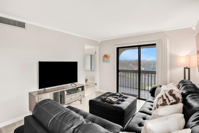 living room with ornamental molding