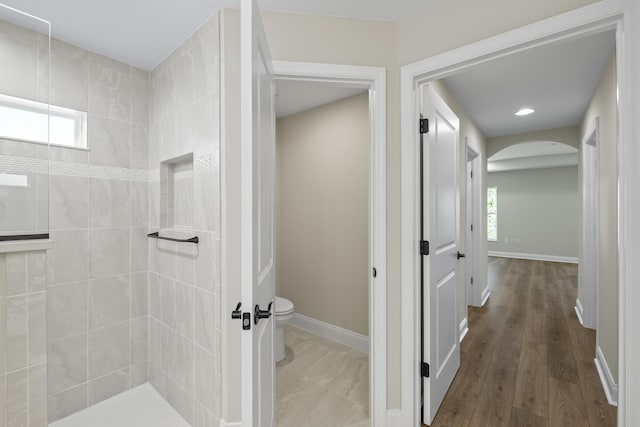 45 Laguna Forest Trl, Palm Coast, FL 32164 - full bath featuring walk in shower, toilet, and baseboards