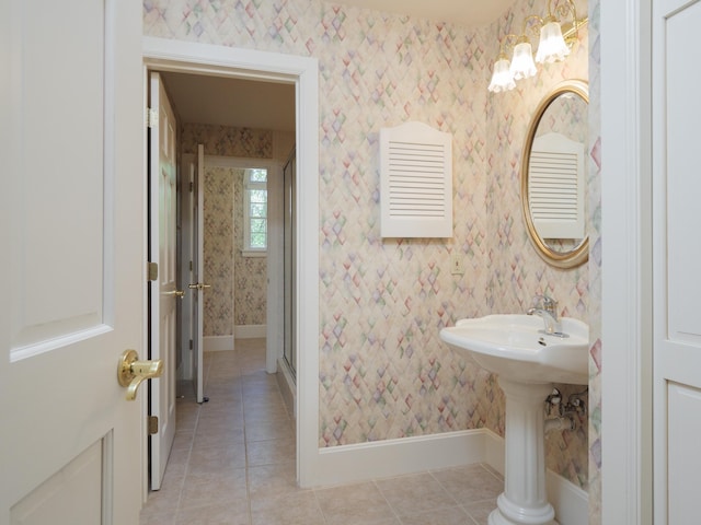 bathroom with tile patterned floors