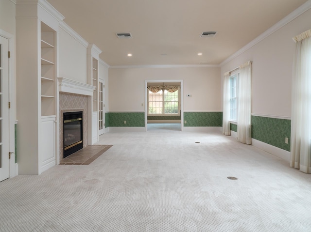 unfurnished living room with light carpet, built in features, and a fireplace