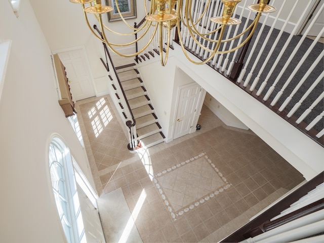 stairway featuring tile patterned floors