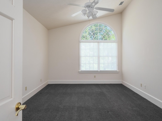 carpeted empty room featuring ceiling fan and lofted ceiling