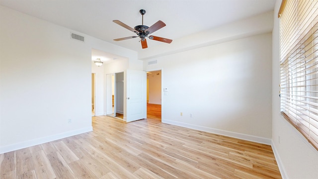 unfurnished room featuring ceiling fan and light hardwood / wood-style flooring