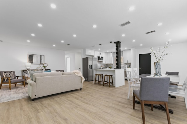 living room featuring light wood-type flooring