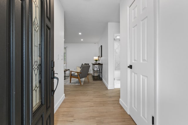 foyer with light hardwood / wood-style floors