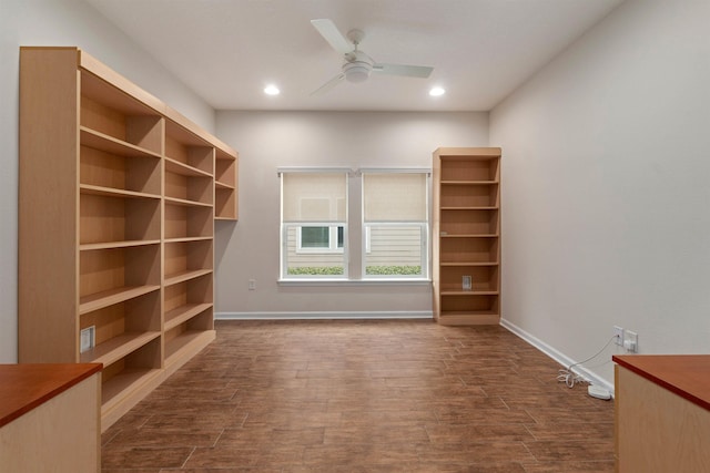 spare room with dark wood-style floors, recessed lighting, a ceiling fan, and baseboards