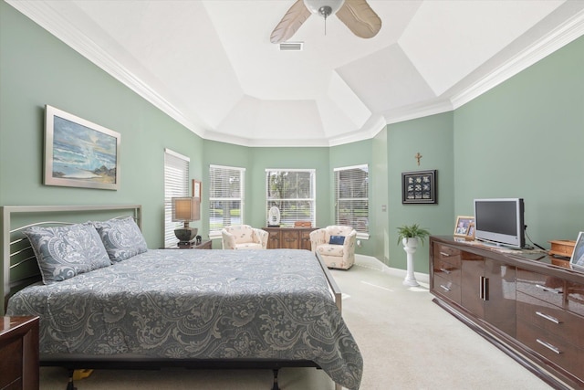 carpeted bedroom with ceiling fan and ornamental molding