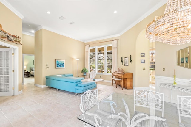 tiled living room featuring ornamental molding and an inviting chandelier