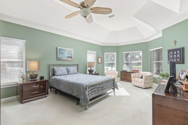 bedroom with ceiling fan, light colored carpet, and ornamental molding