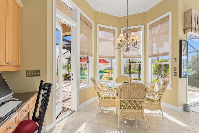 sunroom / solarium featuring a notable chandelier