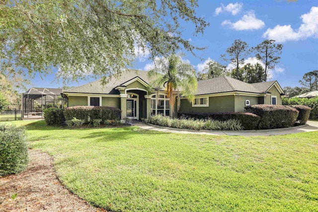 single story home with glass enclosure and a front lawn