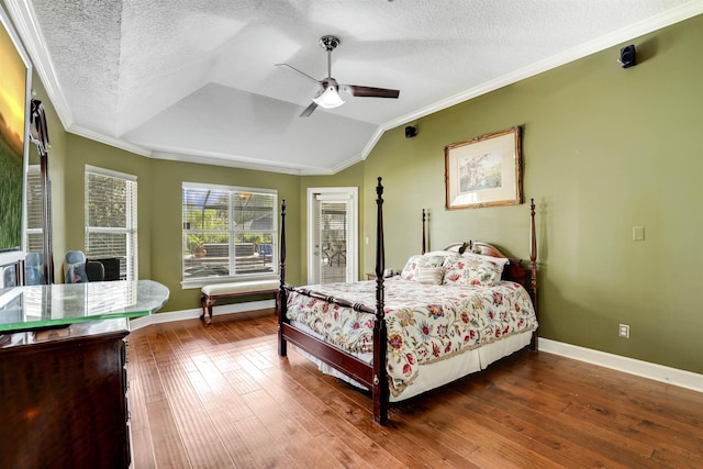 bedroom featuring ceiling fan, wood-type flooring, and a textured ceiling