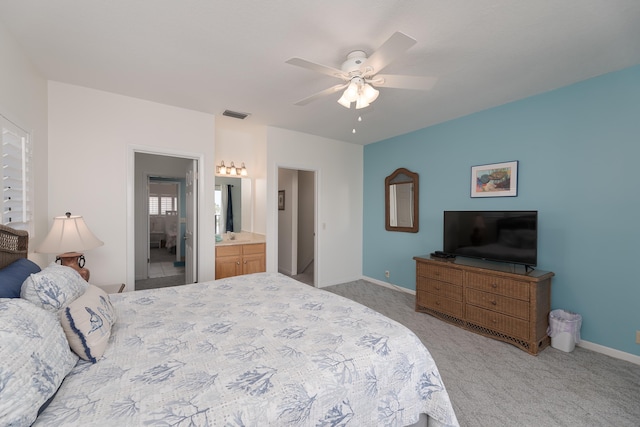 850 A1A Beach Blvd Unit 42, Saint Augustine Beach, FL 32080 - bedroom featuring carpet floors, baseboards, a ceiling fan, and ensuite bath