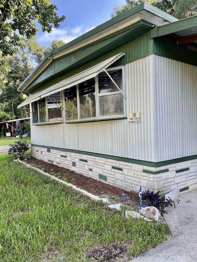 view of property exterior with crawl space