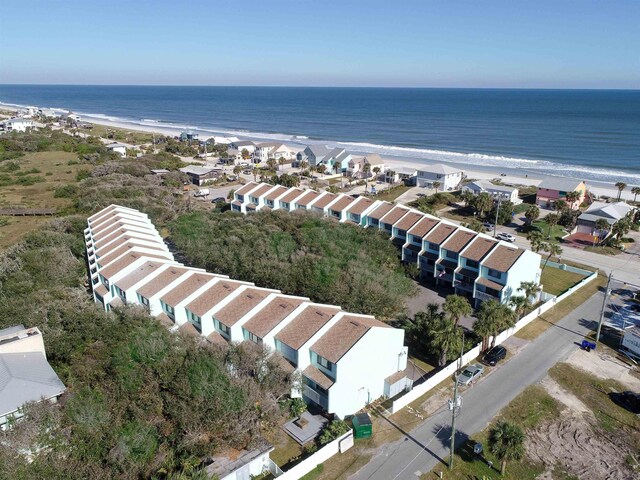 aerial view featuring a water view and a view of the beach