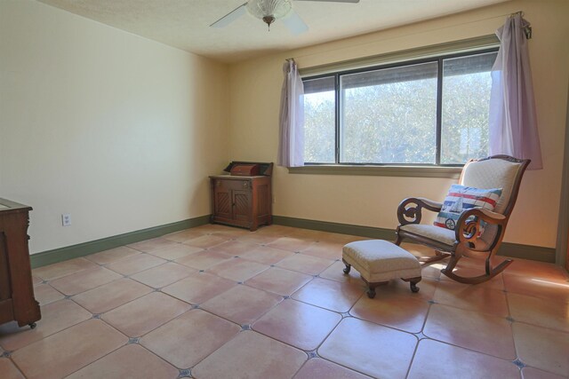 unfurnished room with ceiling fan