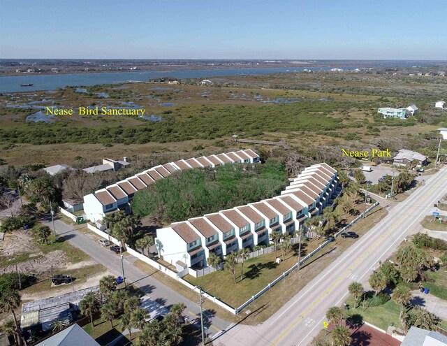 bird's eye view with a water view