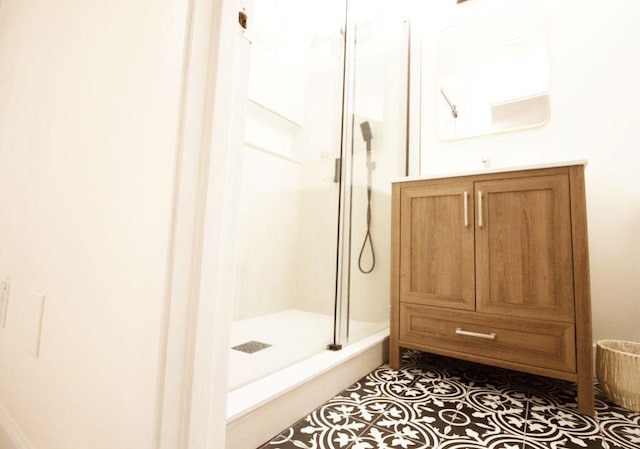 2007 NE 21st Ter E, Jensen Beach, FL 34957 - full bathroom featuring a shower stall and vanity