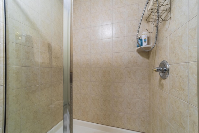 bathroom featuring an enclosed shower