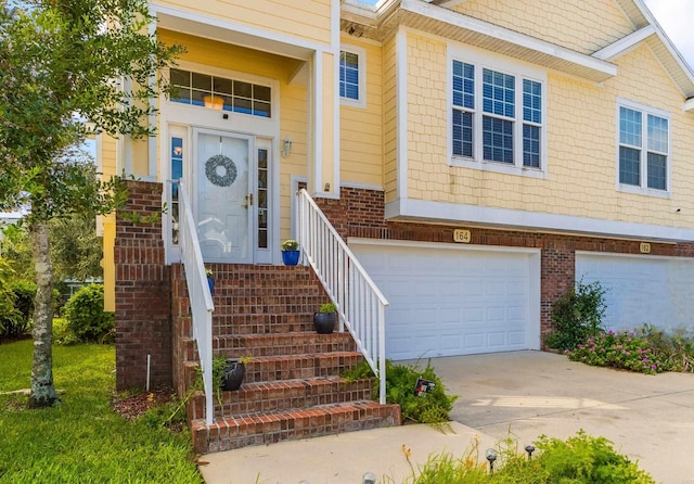 entrance to property featuring a garage