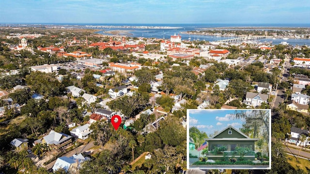 birds eye view of property featuring a water view