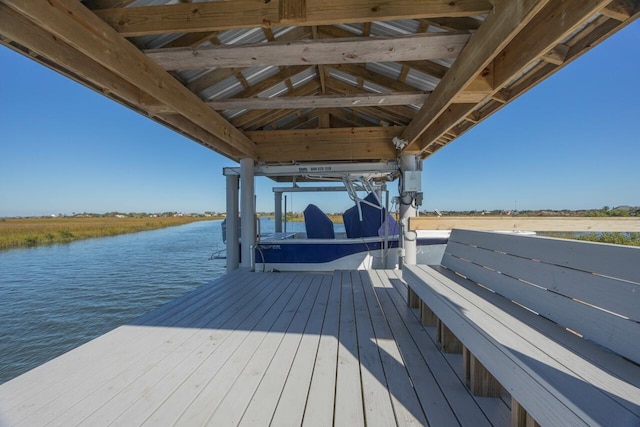 view of dock with a water view