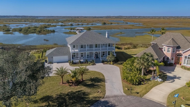 drone / aerial view with a water view