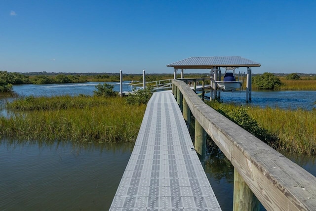 view of dock with a water view