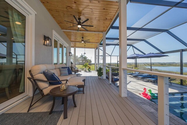 exterior space with a water view and an outdoor hangout area