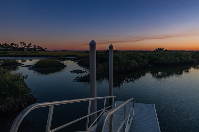 dock area featuring a water view