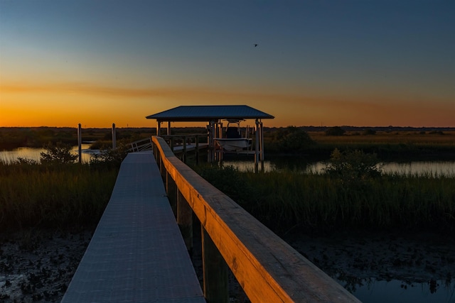 view of dock with a water view