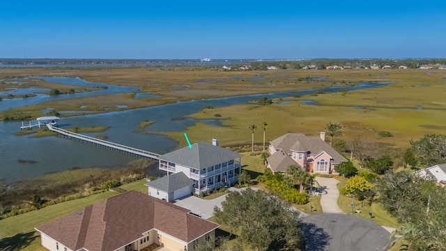 aerial view with a water view and a rural view