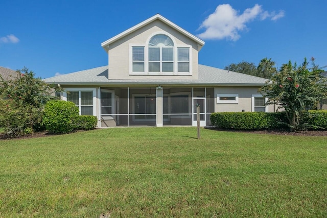 view of side of home featuring a yard