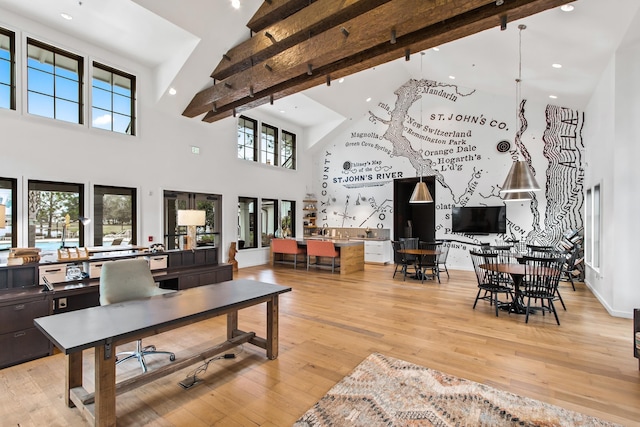 269 Clarys Run, Saint Augustine, FL 32092 - living area with high vaulted ceiling, beamed ceiling, a desk, light wood-style floors, and recessed lighting