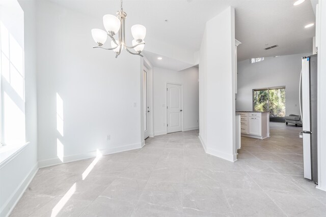 272 Grand Ravine Dr, Saint Augustine, FL 32086 - unfurnished dining area with recessed lighting, a chandelier, and baseboards