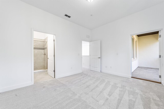 272 Grand Ravine Dr, Saint Augustine, FL 32086 - unfurnished bedroom featuring carpet, baseboards, and ensuite bathroom