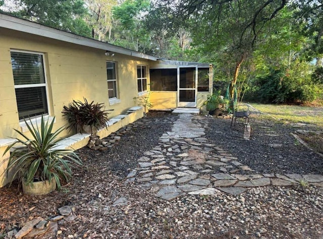 16325 SE 134th Ct, Weirsdale, FL 32195 - view of patio featuring a sunroom