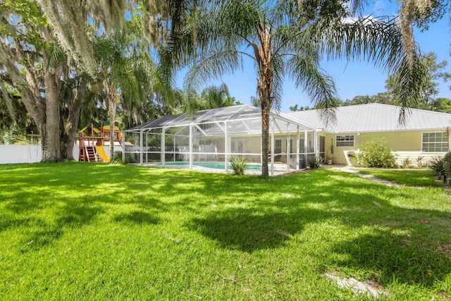 102 Saint Johns Blvd, East Palatka, FL 32131 - view of yard featuring an outdoor pool and glass enclosure