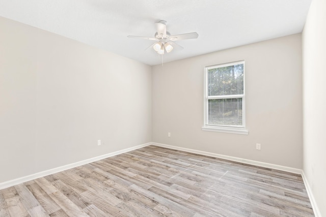 unfurnished room featuring ceiling fan and light hardwood / wood-style floors