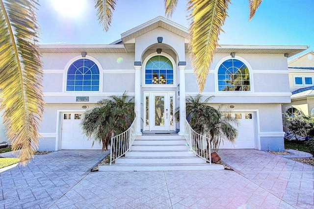 view of front of property with a garage