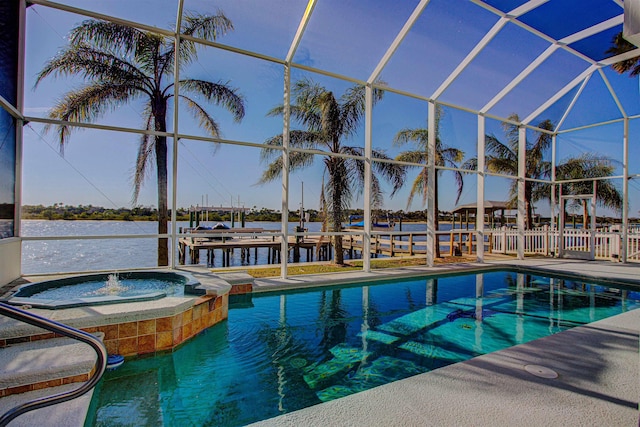 view of swimming pool featuring a water view, an in ground hot tub, and glass enclosure