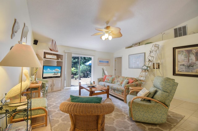 1711 Old Beach Rd, Saint Augustine, FL 32080 - living room featuring vaulted ceiling, a ceiling fan, and tile patterned flooring