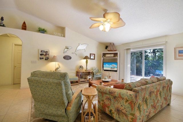 1711 Old Beach Rd, Saint Augustine, FL 32080 - living room featuring light tile patterned floors, arched walkways, and a ceiling fan