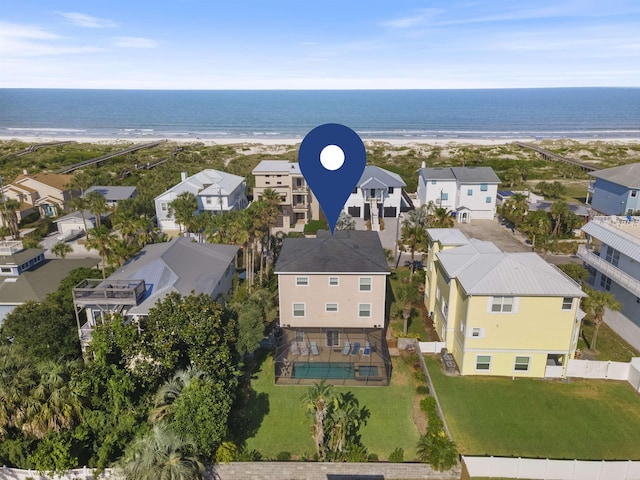 bird's eye view with a water view and a residential view