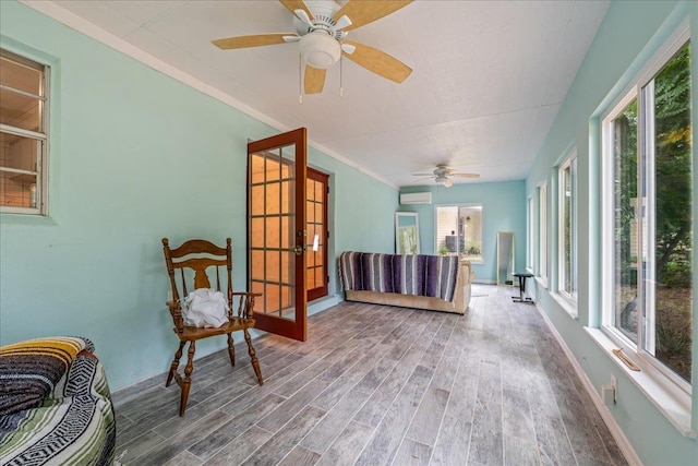 603 Mariposa St, Saint Augustine Beach, FL 32080 - sunroom with french doors, wood finished floors, plenty of natural light, and crown molding